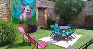 Jardin avec graff - Médiathèque La Fabrik Jardin avec graff - Médiathèque La Fabrik