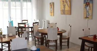 La salle des petits déjeuners de l'Hôtel au Marais La salle des petits déjeuners de l'Hôtel au Marais